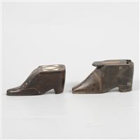 Lot 154 - Pair of treen carved wooden shoe snuff boxes both with metal stud detail and sliding tops, 9cm. (2)