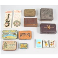 Lot 151 - A collection of small tins and boxes.
