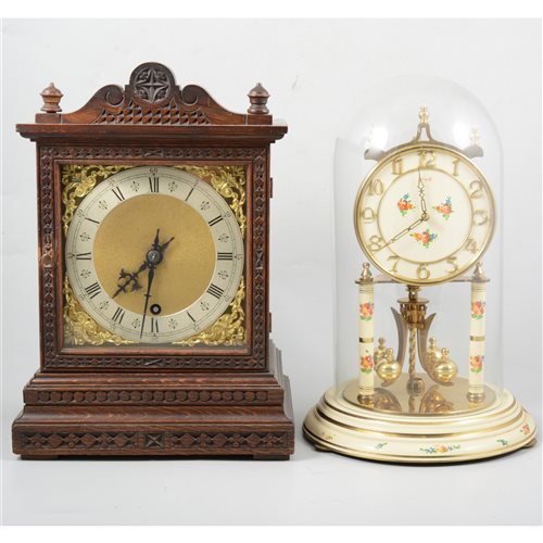 Lot 163 - An oak cased mantel clock, German movement; a late 20th Century anniversary clock, a tray and an oil lamp.