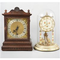 Lot 163 - An oak cased mantel clock, German movement; a late 20th Century anniversary clock, a tray and an oil lamp.