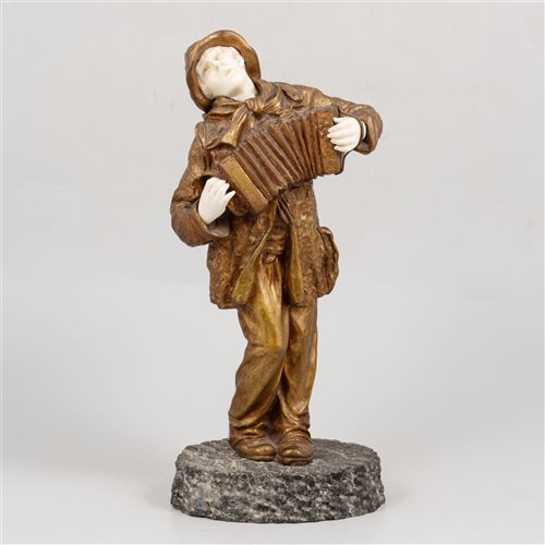 Lot 592 - A gilt bronze and carved ivory sculpture of an accordion player, by Demétre Chiparus.