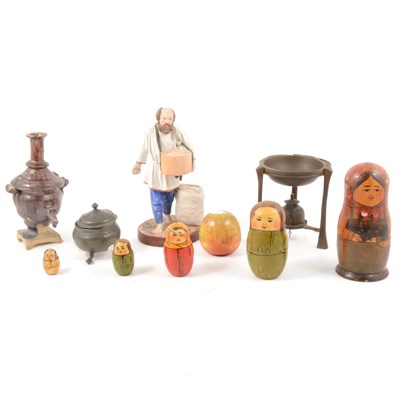 Lot 262 - A Russian Matryoshka, figure sowing grain, incense bowl, apple, glazed model of an urn.