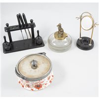 Lot 146 - A circular plain glass ink well with brass model of a dog to top, a framed Staffordshire pot lid "That No Jealeous Rival Shall Laugh Me to Scorn", .