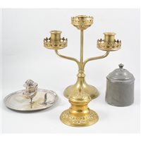 Lot 169 - A brass three light Ecclesiastical candelabrum, 26cm, circular brass inkwell, embossed design with hinged cover and glass well