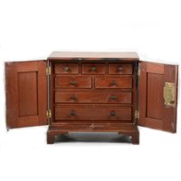 Lot 83 - A mahogany two door table cabinet with fitted interior