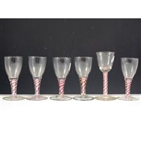 Lot 6 - Collection of six wine glasses, rounded funnel bowl, ruby and opaque twist stems.