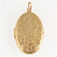 Lot 298 - An oval yellow metal locket, scroll engraved design, satin finish back, 50mm x 33mm, pendant loop marked 9ct, approximate weight 12.3gms.