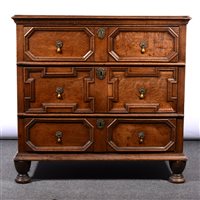 Lot 480 - Joined oak chest of drawers, in part Early 18th Century, three long drawers, each with recessed geometric mouldings, turned feet, width 92cm.