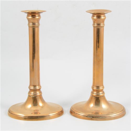 Lot 76 - A pair of 19th Century gunmetal candlesticks, 23cm high, plain oval bases and cylindrical stem. (2)