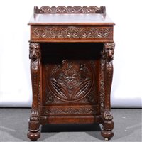 Lot 535 - Victorian carved oak Davenport.