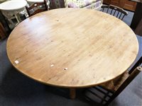Lot 449 - Large circular pine kitchen table.