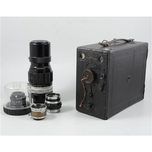 Lot 84 - A collection of cameras and equipment, including a Craven drop box camera, a Nikon lens and a Tamron lens (2 boxes)