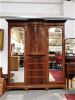 Lot 469 - Edwardian mahogany inlaid two-piece bedroom suite, comprising a triple combination wardrobe and dressing table.