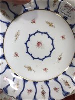 Lot 54 - Pair of Royal Worcester comports, dated 1876, decorated with sprays of wild flowers, diameter 24cm and a Coalport part dessert service, (7).
