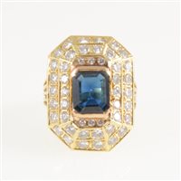 Lot 252 - A large sapphire and diamond rectangular cluster ring, a rectangular step cut sapphire 9.7mm x 7.8mm x 3.2mm, semi rubbed over set and surrounded by a double row of brilliant cut diamonds