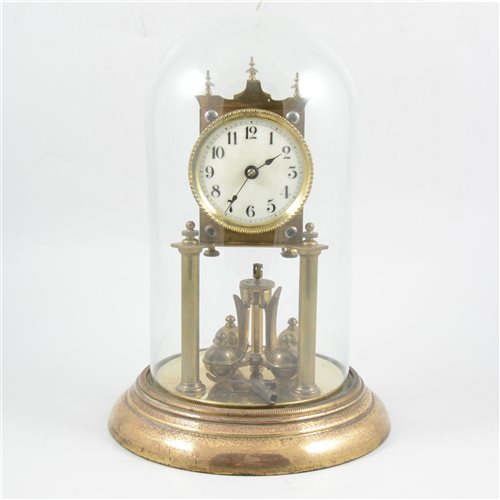 Lot 93 - A brass anniversary clock, with white enamelled dial with Arabic numerals.
