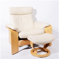 Lot 689 - A 'Stressless Pegasus' white leather reclining armchair and footstool, by Ekornes