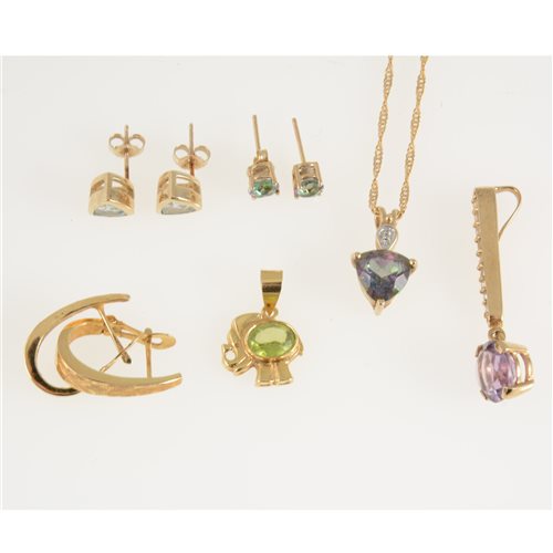 Lot 280 - A collection of gold jewellery, trigon pendant on a twisted rope link chain, amethyst pendant, two pairs of stud earrings, pair of hoop earrings, all for pierced ears.