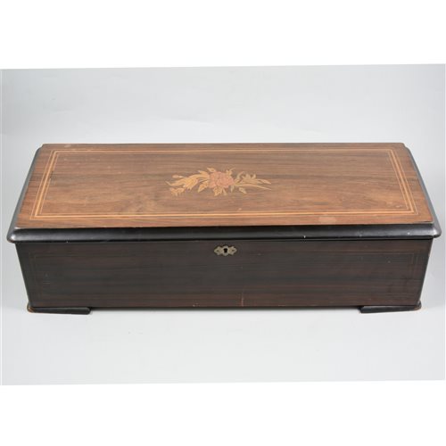 Lot 150 - A Swiss musical box playing twelve airs, stained wood case with inlaid rosewood lid.