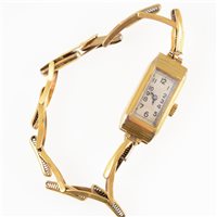 Lot 326 - A lady's vintage wrist watch, rectangular arabic dial in a 9 carat yellow gold case hallmarked Edinburgh 1934 on a 9 carat expanding bracelet