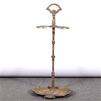 Lot 543 - A cast brass stick stand