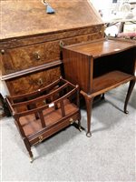 Lot 545 - A reproduction mahogany canterbury