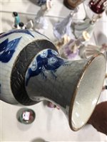 Lot 30 - A Japanese crackle glazed blue and white vase, baluster shape, painted with bird and flowers, 30cm.