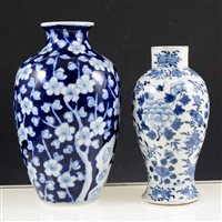 Lot 38 - Chinese blue and white porcelain baluster vase, bearing four character mark, decorated with flowers and birds, 18cm and another blue and white vase, (2).
