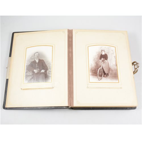 Lot 136 - Victorian black leather bound family photo album including one with a vintage bicycle.