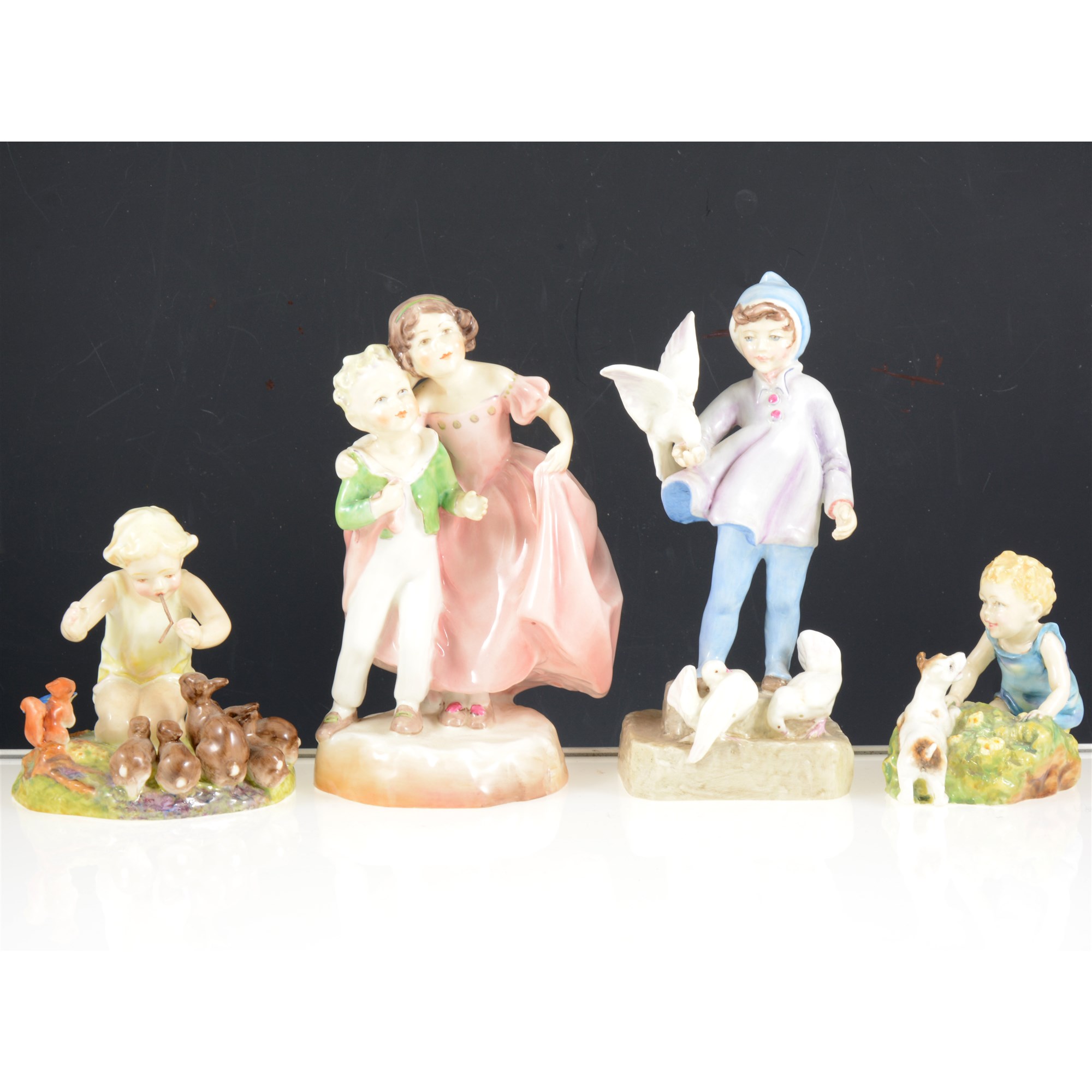 Lot 18 A collection of Royal Worcester figurines,