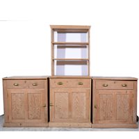 Lot 366 - Stripped pine kitchen dresser base, adapted to three sections