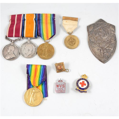 Lot 218 - A collection of WW1 medals and other military badges, including M2-223508 Cpl. F. B. Briggs R.A.S.C. the Meritorious Service Medal, British War Medal, the Victory Medal (9)