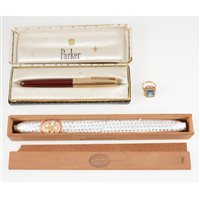 Lot 317 - A Parker pen in original box - burgundy barrel, rolled-gold cap, a yellow metal ring size N, Cuban cigar Monterrey. (3)