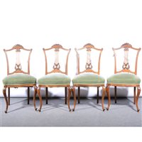 Lot 421 - A set of four Edwardian stripped walnut salon chairs.