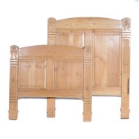 Lot 453 - Stripped pine single bed, panelled head and footboards with side rails, width 94cm.