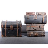 Lot 501 - Edwardian cloth and leather domed top trunk, by Richard Clamp, Liverpool, 77cm; two old leather suitcases; another cloth trunk and two attache cases, (6).