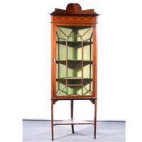 Lot 348 - Edwardian inlaid mahogany freestanding corner cupboard.