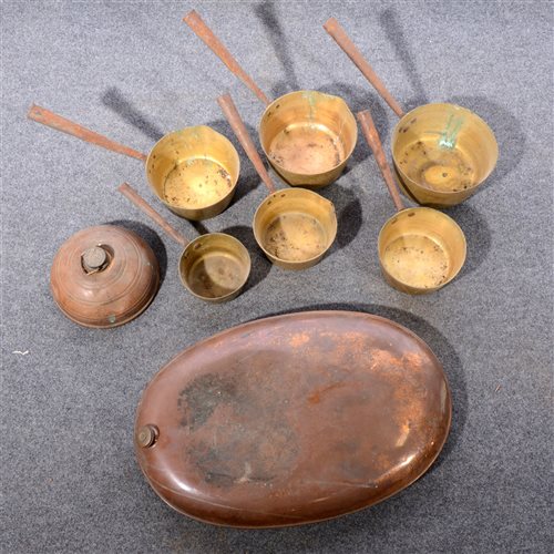 Lot 107 - Copper foot warmer, width 61cm, a collection of brass saucepans and other metalware.