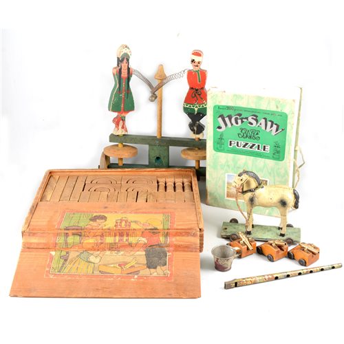 Lot 100 - Vintage and wooden toys and puzzles.