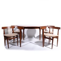 Lot 625 - An extending teak dining table and six chairs by Hans Olsen for Frem Rojle