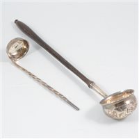 Lot 373 - A silver toddy ladle with a barley twist stem by Roberts & Slater, Sheffield 1855, 18cm; and a white metal toddy ladle, set with Spanish 2 reales silver coin dated 1717, wooden handle. (2)