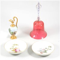 Lot 10 - Pair of Meissen saucers, painted with pierrot and a lady gardener, diameter 14cm, an Italian style porcelain ewer and cranberry glass table bell, (4).
