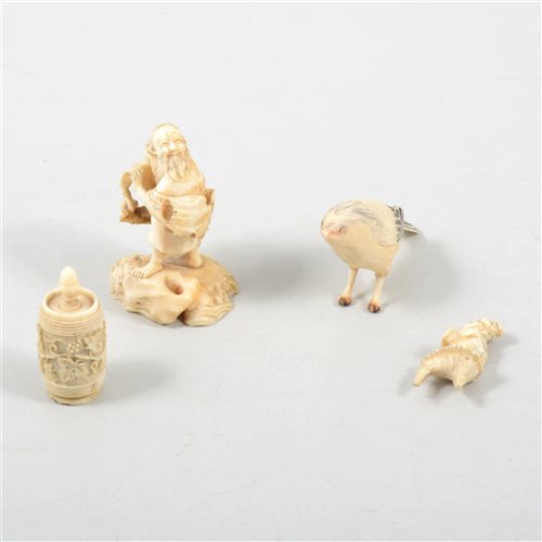 Lot 97 - A Japanese ivory netsuke of a warrior and three other small carved ivory items (4)