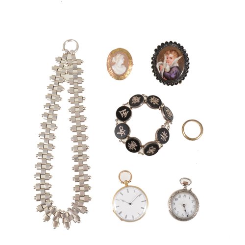 Lot 228 - A collection of vintage jewellery, silver coloured collar, an oval carved shell cameo brooch, two fob watches, jet style brooch, ring and oriental bracelet. (7)