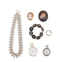 Lot 228 - A collection of vintage jewellery, silver coloured collar, an oval carved shell cameo brooch, two fob watches, jet style brooch, ring and oriental bracelet. (7)