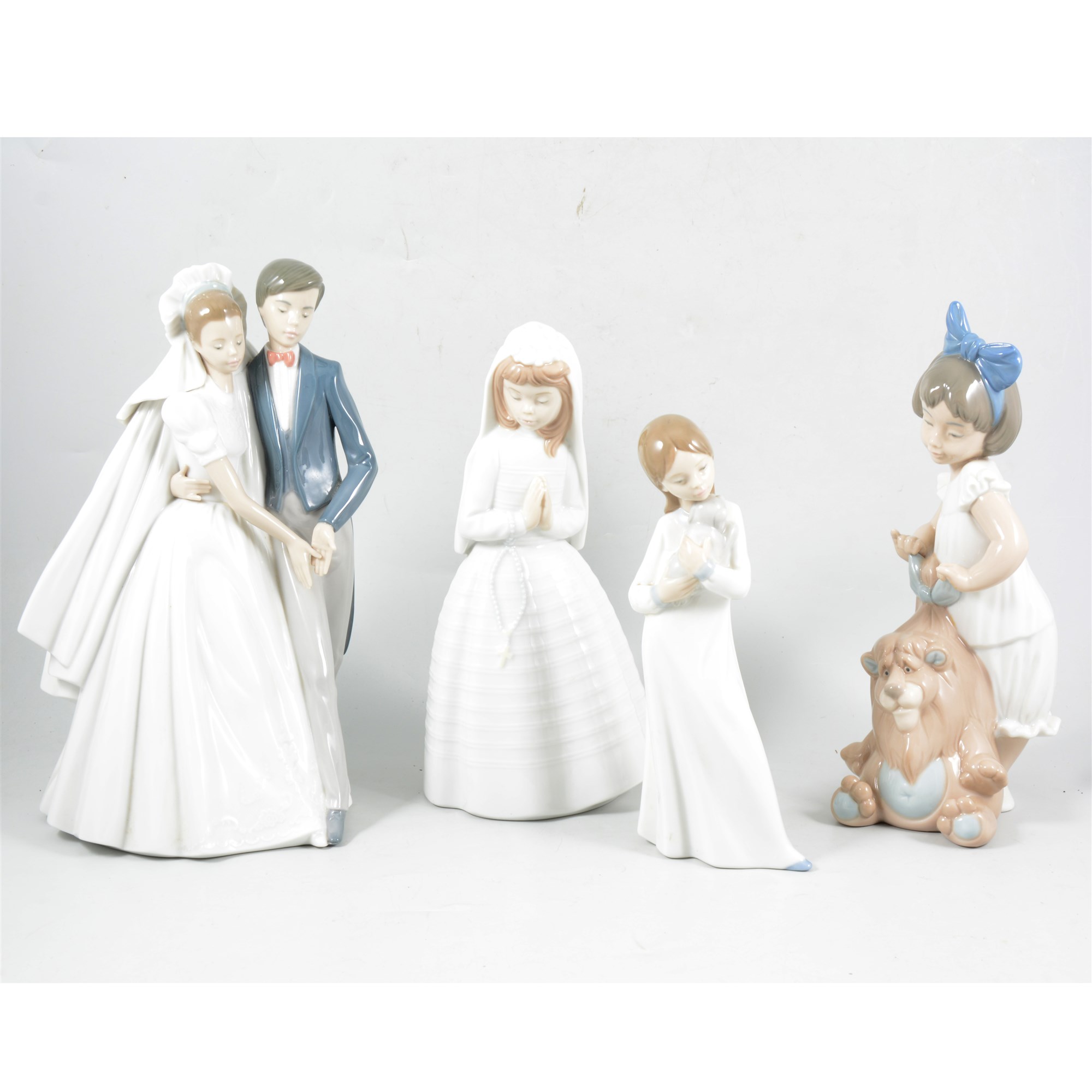 Lot 28 Eight Nao figurines including The Bride and