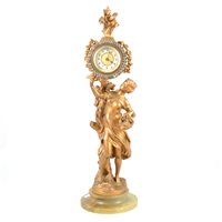 Lot 88 - A French style figural clock with paste bezel to dial.
