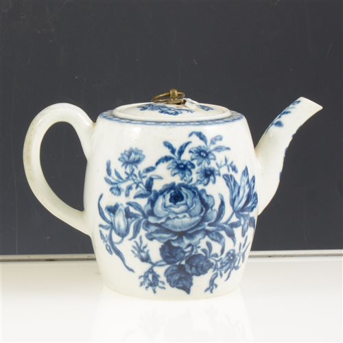 Lot 5 - First period Worcester blue and white teapot, printed rose-centred spray group. circa 1770, restored lid, 10cms.