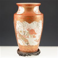 Lot 38 - Satsuma vase, probably Meiji, of shouldered form, panelled decoration with figures, landscapes, birds and flowers, fourteen character inscription to the base, 35cm, on a wooden stand.