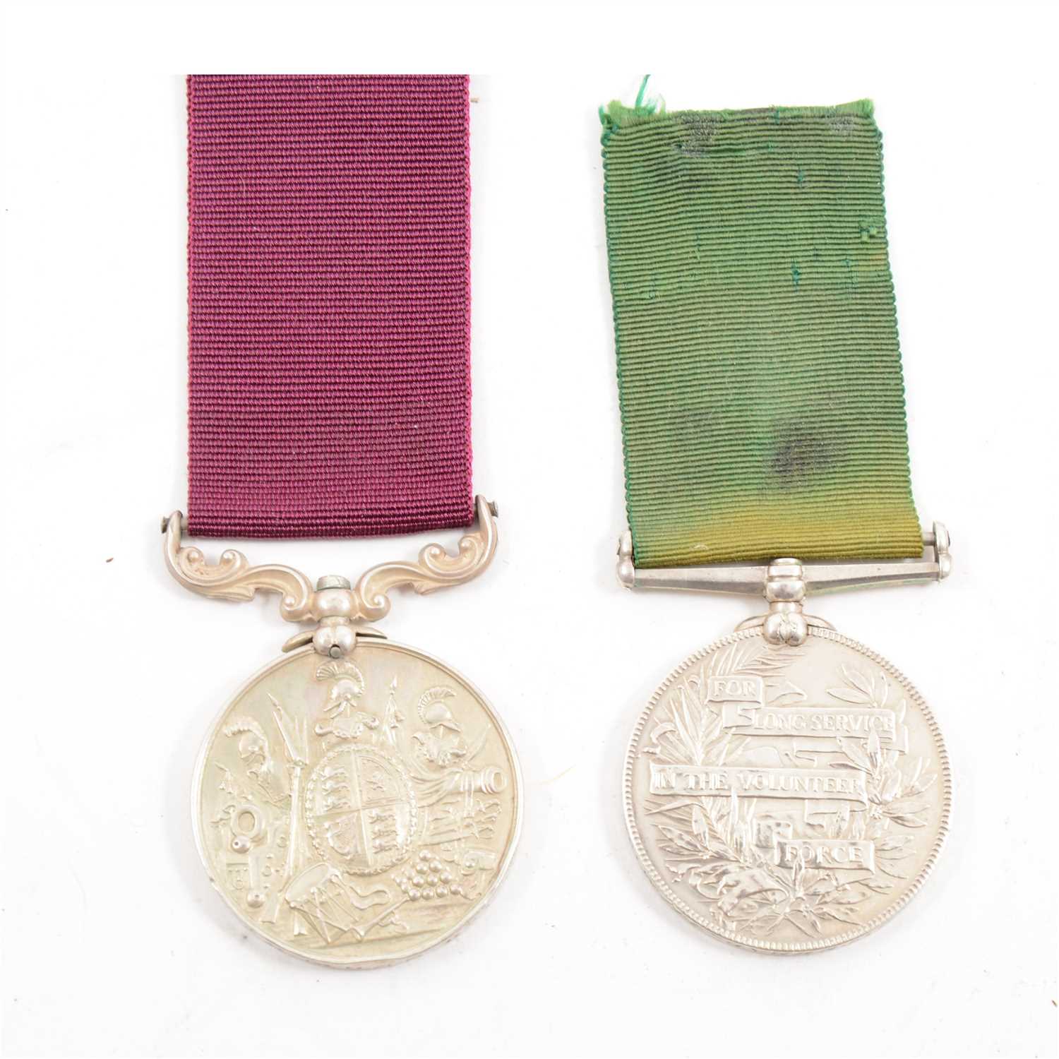 Lot 158 - Volunteer Force Long Service Medal,  Victoria Regina; and an Army Long Service and Good Conduct Medal.